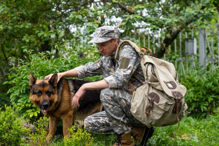 man-in-military-uniform-with-german-shepherd-dog-2022-10-20-18-43-36-utc